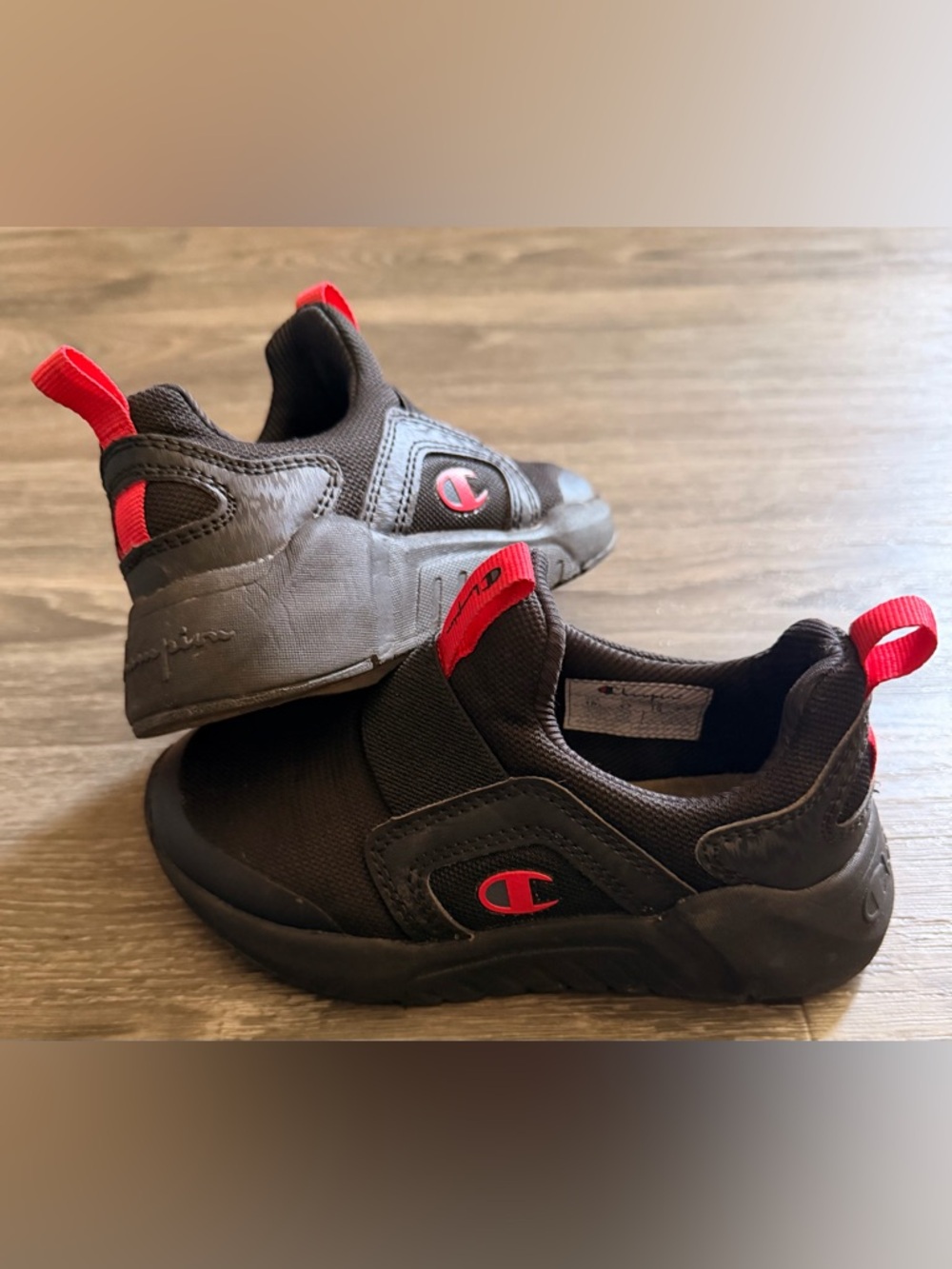 Champion Kids Black Slip-On Sneakers with Red Accents